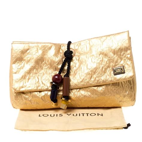 louis vuitton african queen clutch